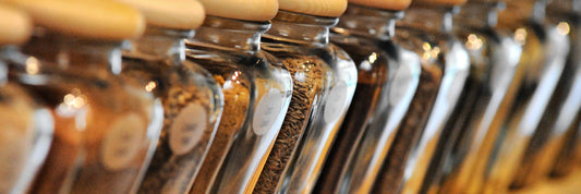 Jars Full of Spice Blends on Wall