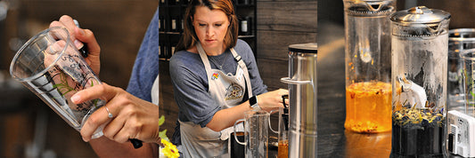 Tea barista writing name on cup, adding hot water to teas, and brewing blue and orange tea.