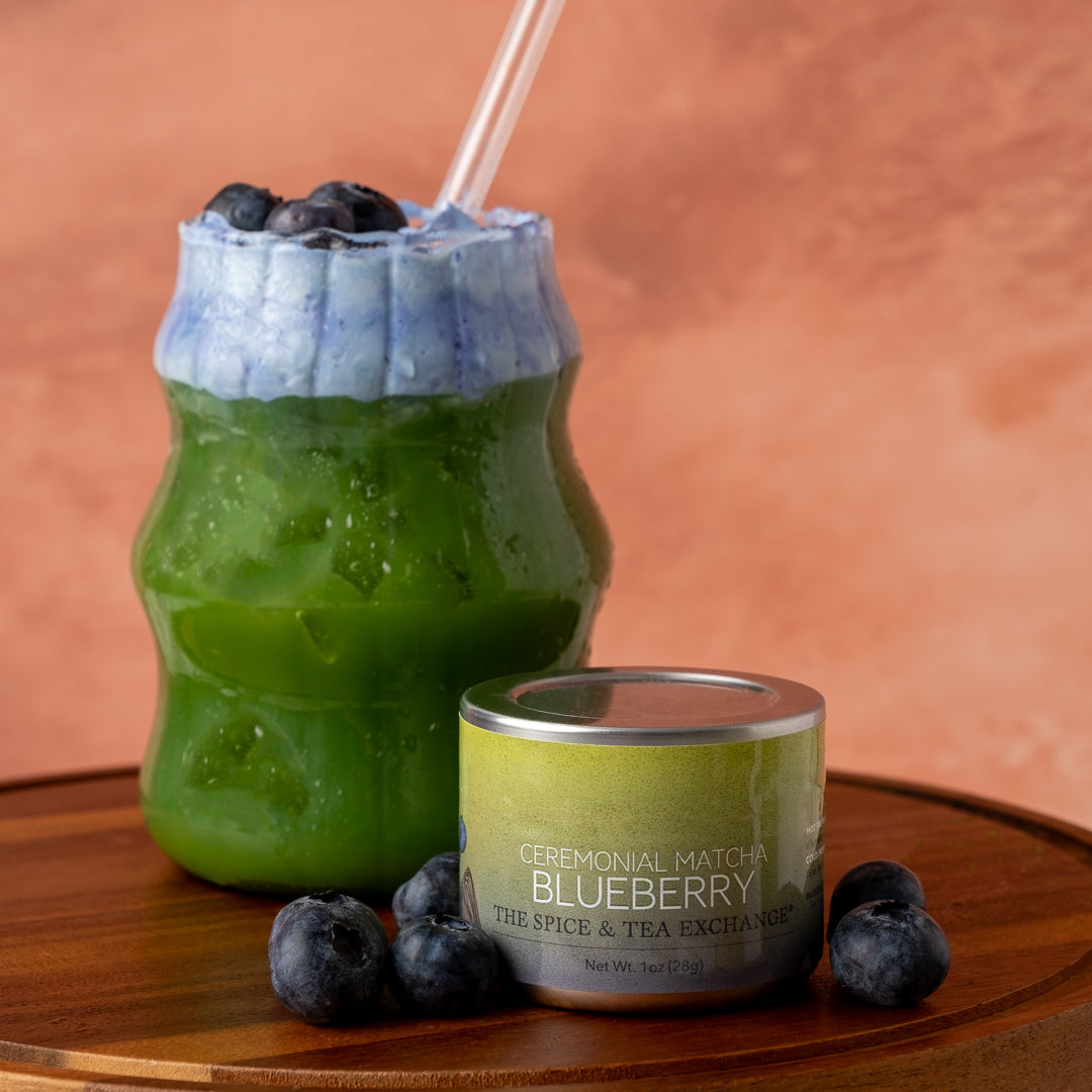 Ceremonial Matcha Blueberry (1 oz tin) - view 2 - next to iced Blueberry Matcha Latte