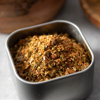 Colonial Seasoning in square tin