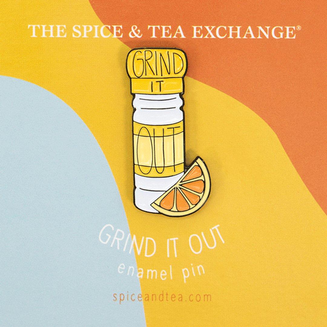 Grind It Out Enamel Pin on cardboard backer