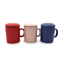 Periwinkle Infuser Mug displayed with red and pink mugs