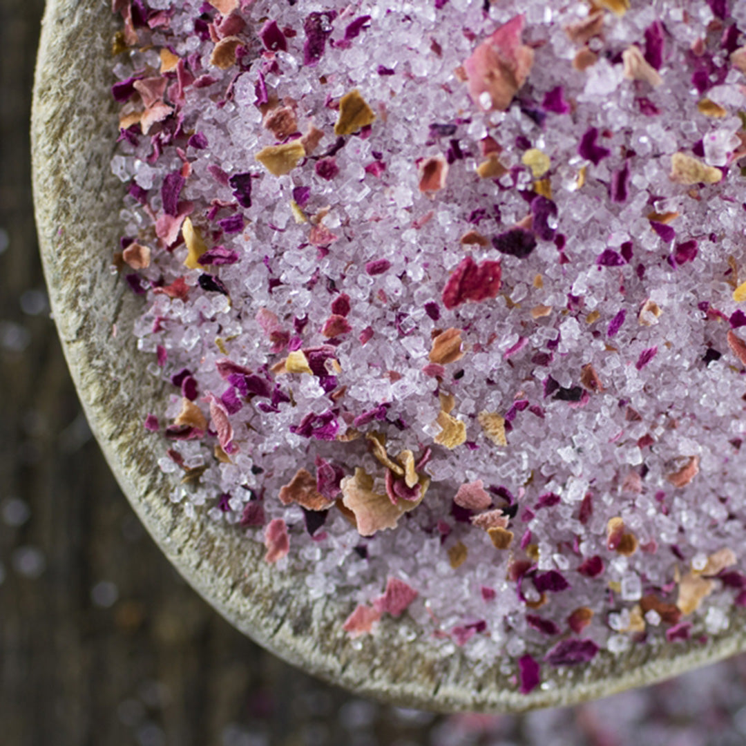 Rose Sugar in wood spoon close up